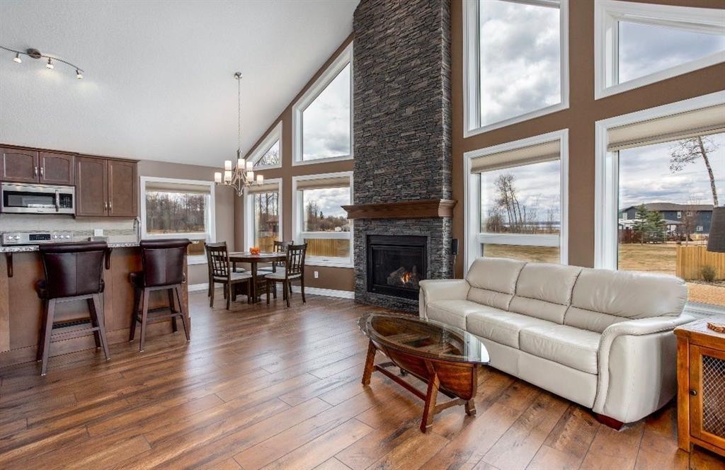 # 219 162 Peace River Avenue, Joussard, AB - Indoor Photo Showing Living Room With Fireplace