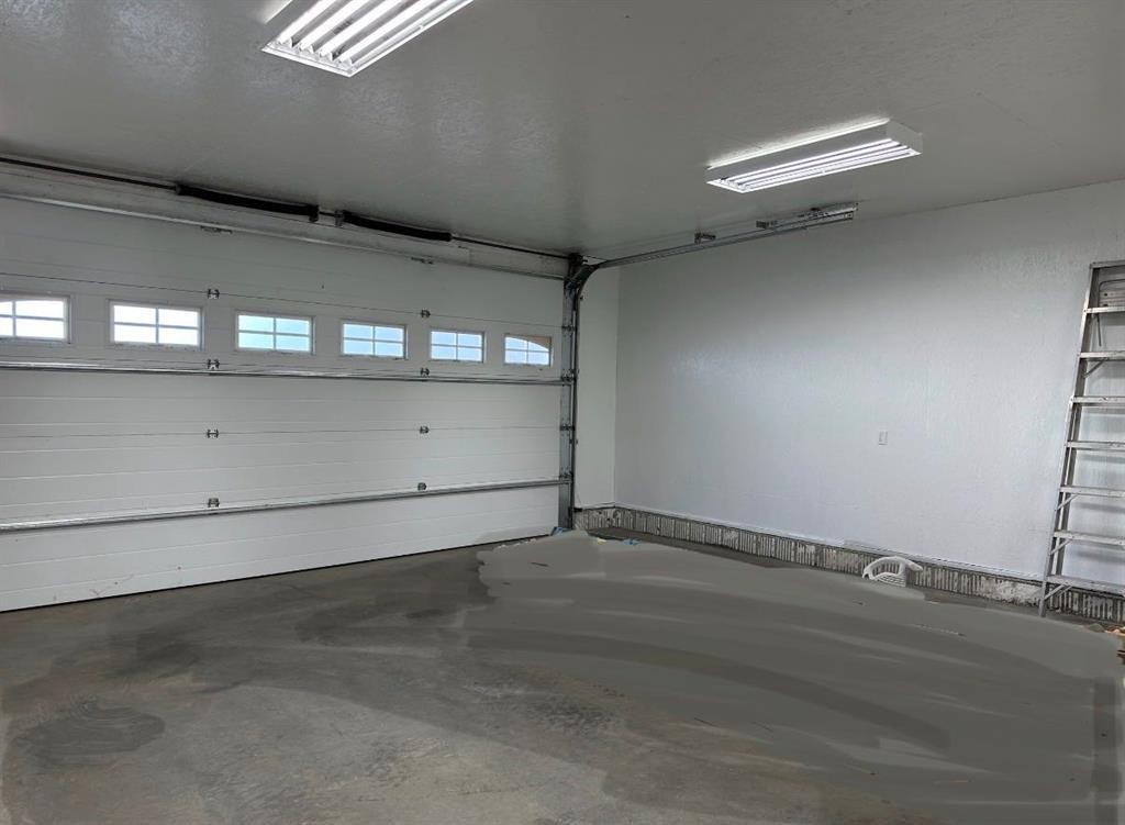 # 219 162 Peace River Avenue, Joussard, AB - Indoor Photo Showing Garage