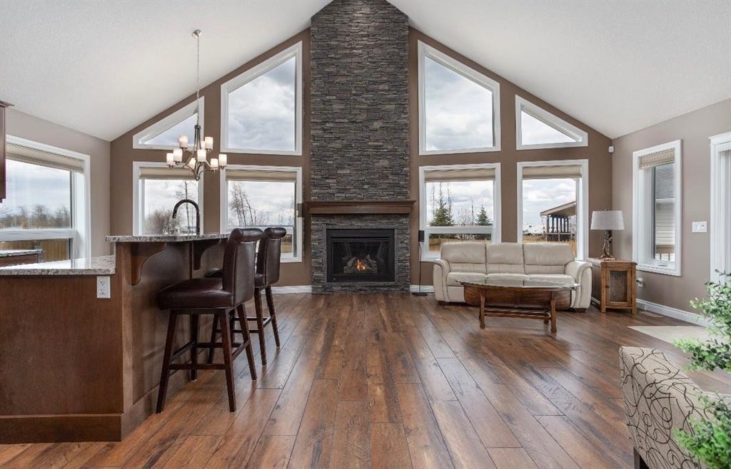 # 219 162 Peace River Avenue, Joussard, AB - Indoor Photo Showing Living Room With Fireplace