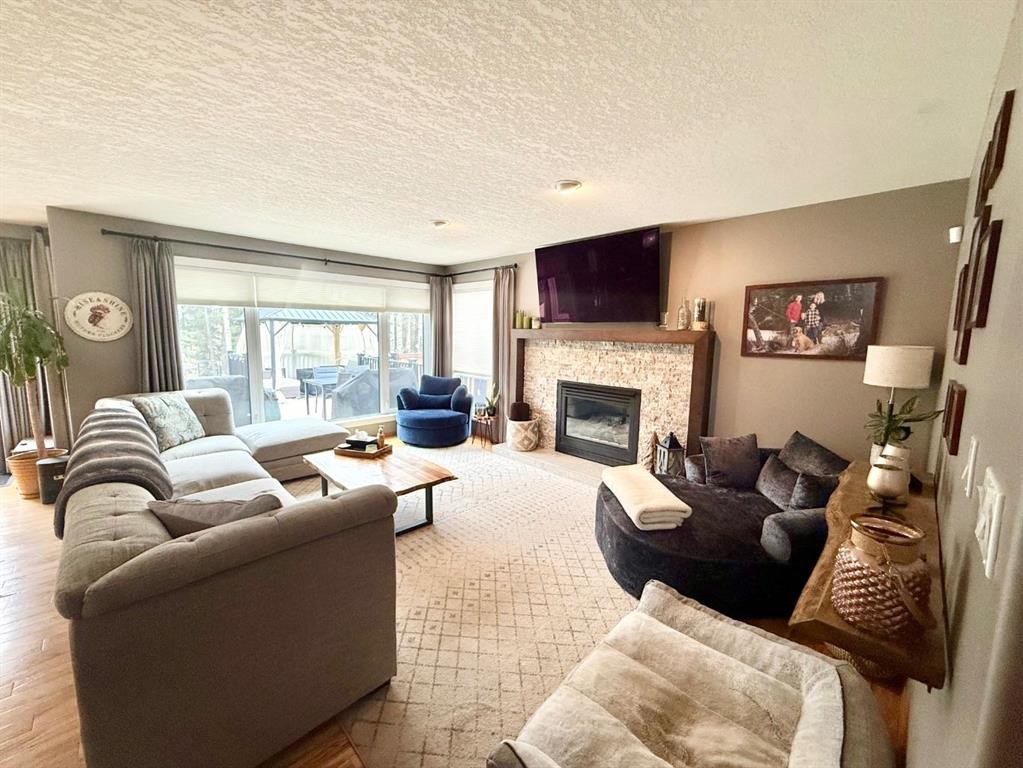 150 Hallam Drive, Hinton, AB - Indoor Photo Showing Living Room With Fireplace