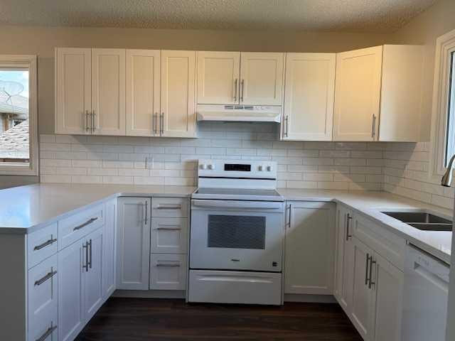 11 Chaisson Crossing, Whitecourt, AB - Indoor Photo Showing Kitchen With Double Sink