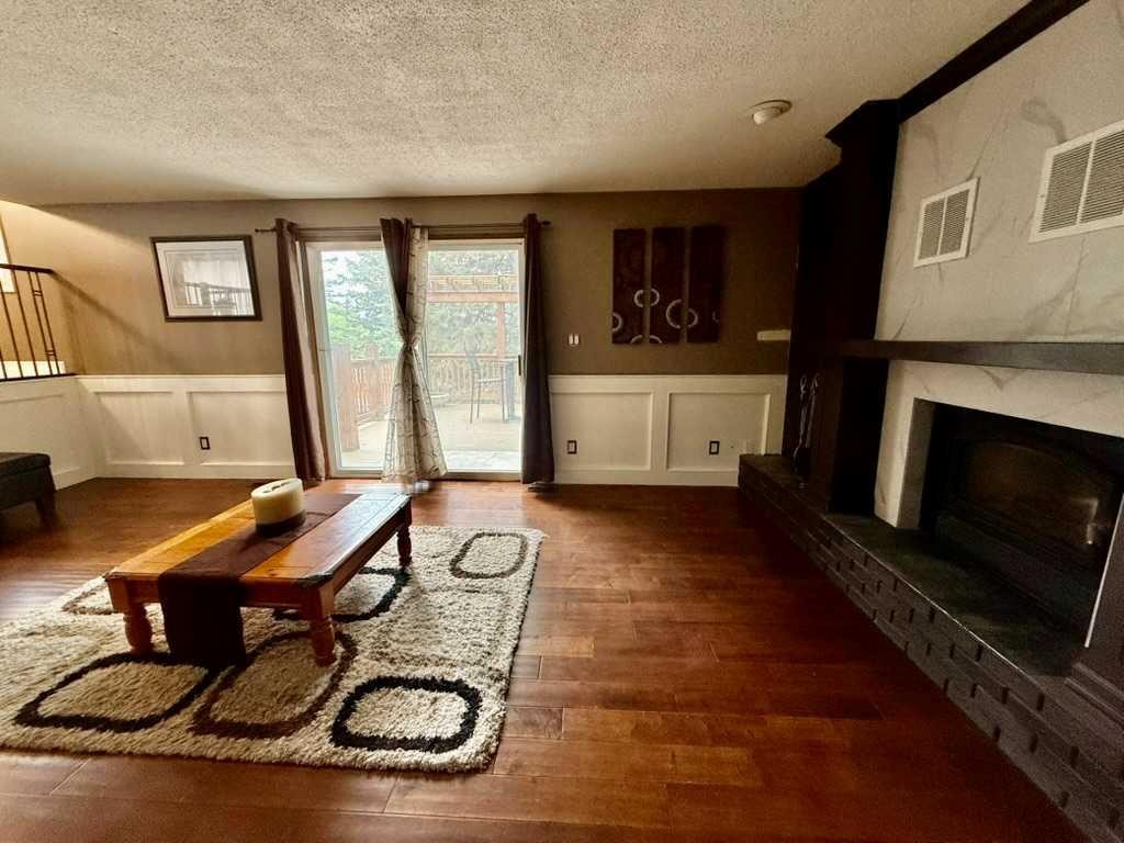 147 Seabolt Crescent, Hinton, AB - Indoor Photo Showing Living Room With Fireplace