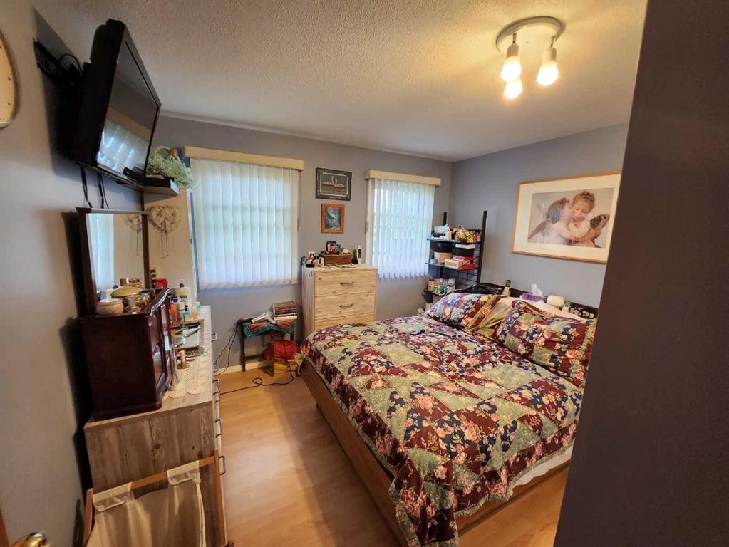 716 6 Avenue, Fox Creek, AB - Indoor Photo Showing Bedroom