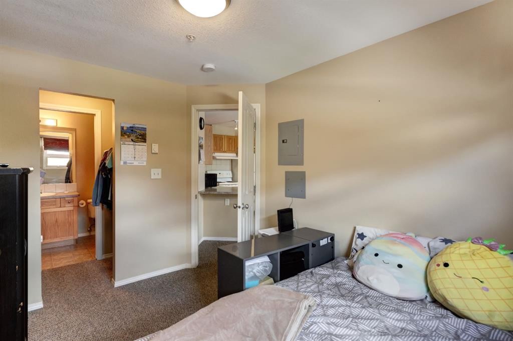 202-186 Kananaskis Way, Canmore, AB - Indoor Photo Showing Bedroom