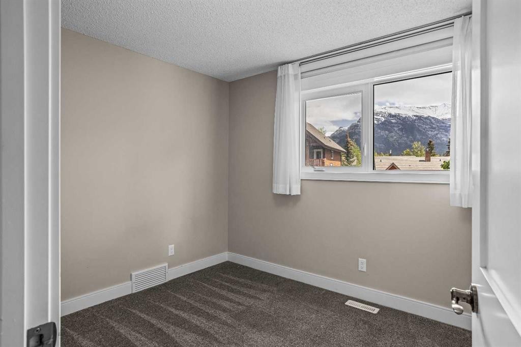 102-200 Three Sisters Drive, Canmore, AB