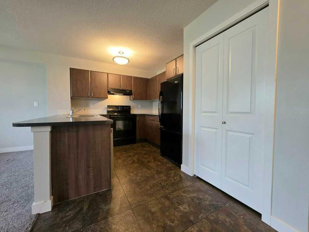 102-709 6 Ave Se, Slave Lake, AB