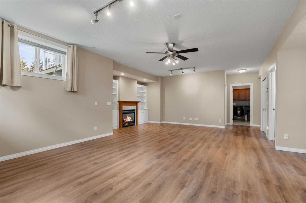 102 Poplar Drive, Whitecourt, AB - Indoor Photo Showing Other Room With Fireplace