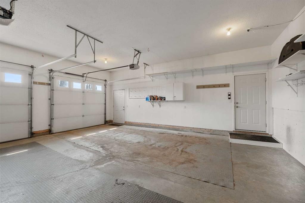 102 Poplar Drive, Whitecourt, AB - Indoor Photo Showing Garage