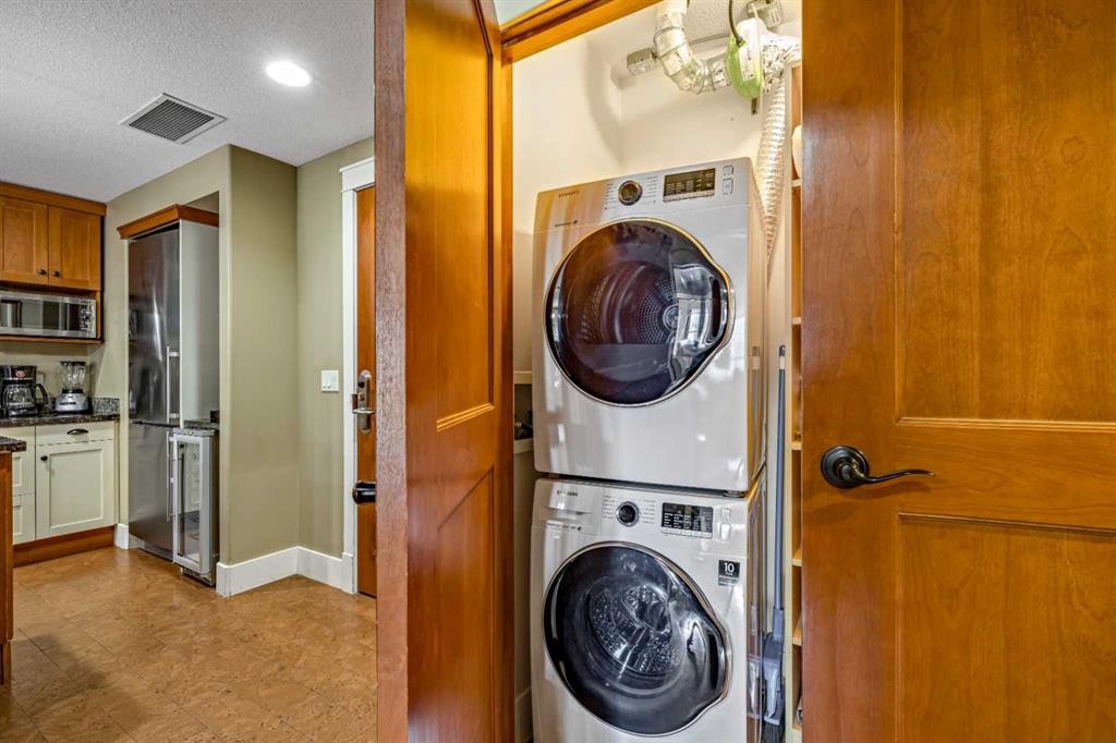 305L-191 Kananaskis, Canmore, AB - Indoor Photo Showing Laundry Room