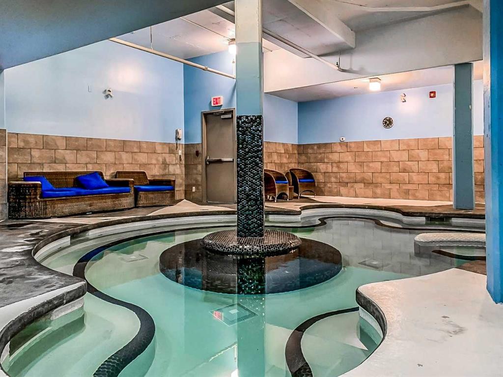 305L-191 Kananaskis, Canmore, AB - Indoor Photo Showing Other Room With In Ground Pool