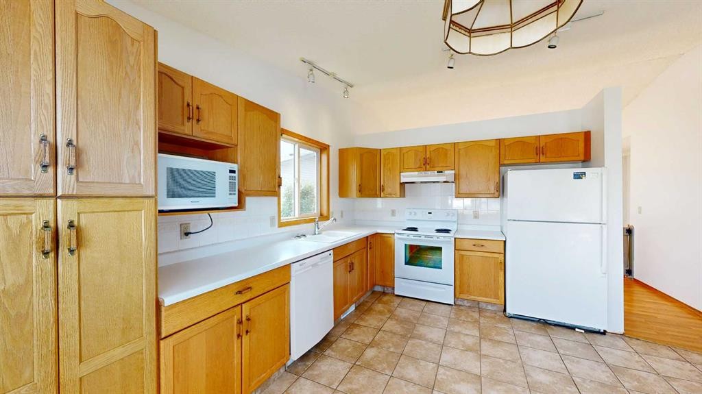 57 Atkinson Crescent, Whitecourt, AB - Indoor Photo Showing Kitchen With Double Sink