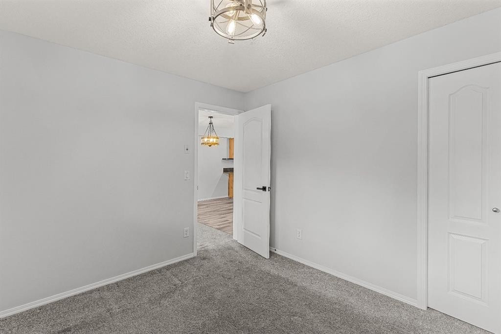 120-300 Palliser Lane, Canmore, AB - Indoor Photo Showing Other Room