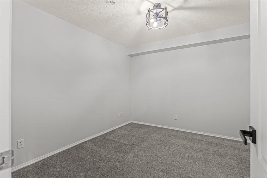 120-300 Palliser Lane, Canmore, AB - Indoor Photo Showing Other Room