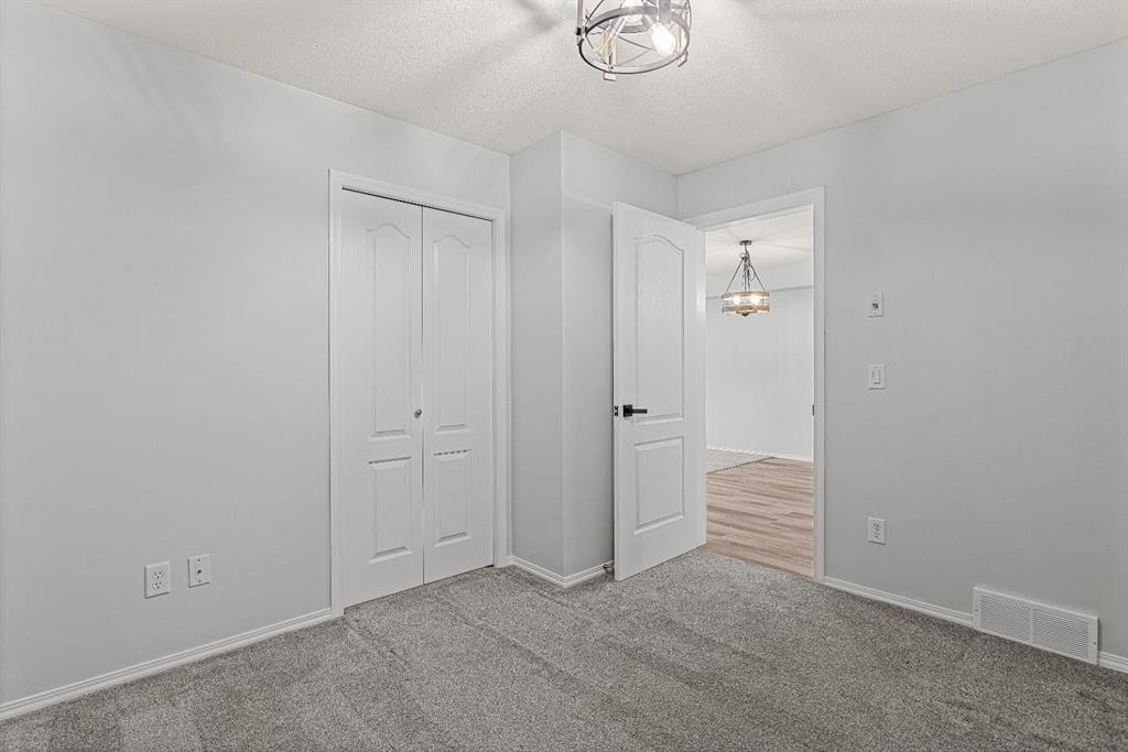 120-300 Palliser Lane, Canmore, AB - Indoor Photo Showing Other Room