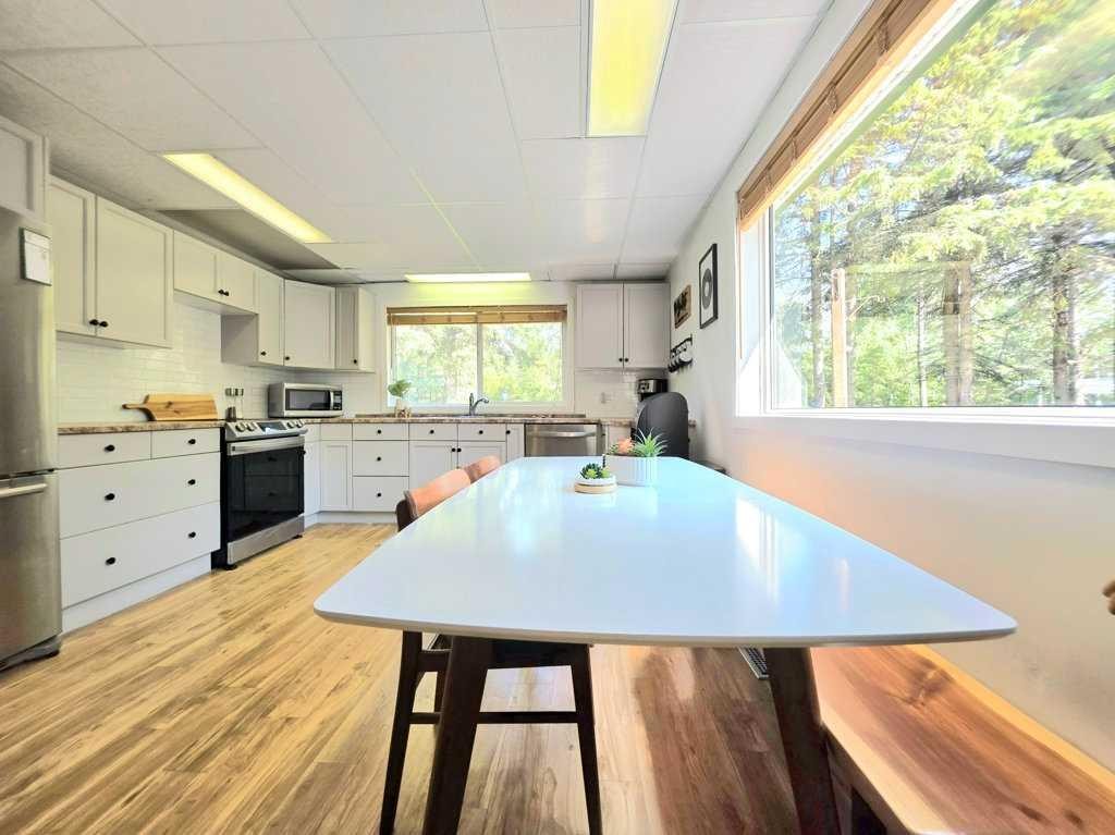 14 Marten Drive, Marten Beach, AB - Indoor Photo Showing Kitchen With Stainless Steel Kitchen