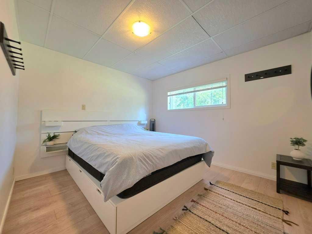 14 Marten Drive, Marten Beach, AB - Indoor Photo Showing Bedroom