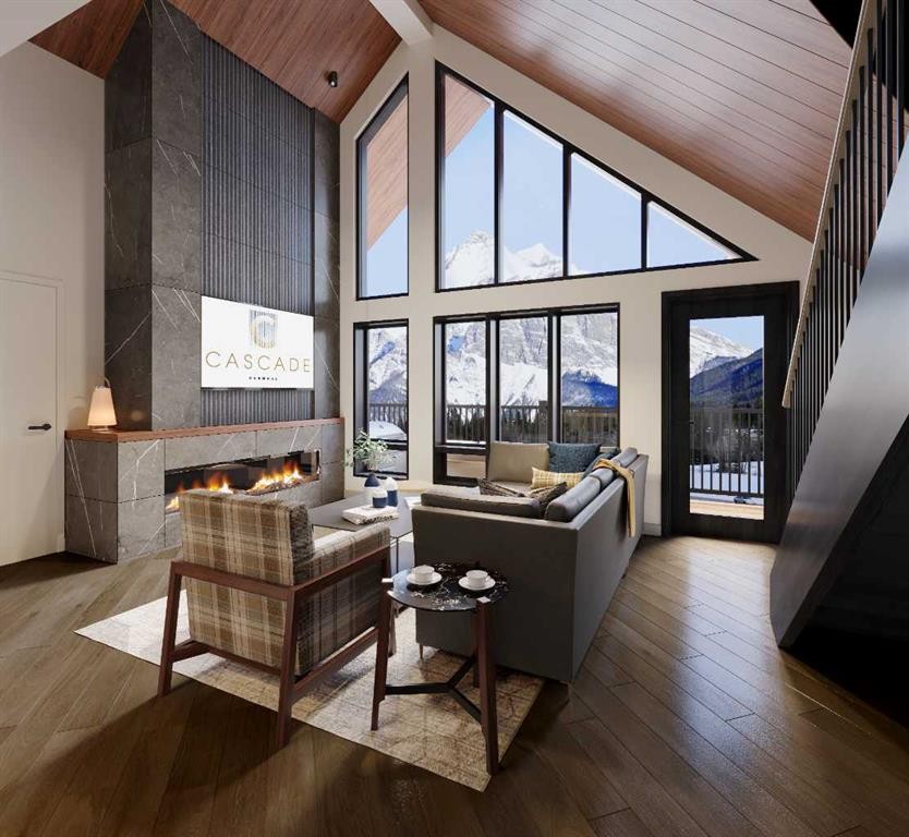 112-1736 Bow Valley, Canmore, AB - Indoor Photo Showing Other Room With Fireplace