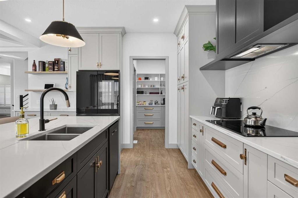 55 Riverdale Bend, Whitecourt, AB - Indoor Photo Showing Kitchen With Double Sink With Upgraded Kitchen