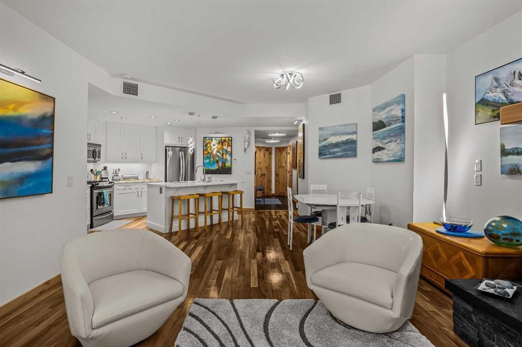 205-600 Spring Creek Drive, Canmore, AB - Indoor Photo Showing Living Room