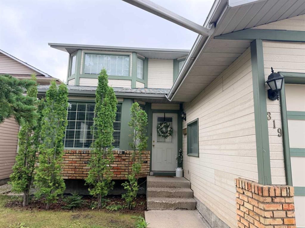 319 Sunvale Drive Se, Calgary, AB - Outdoor With Exterior