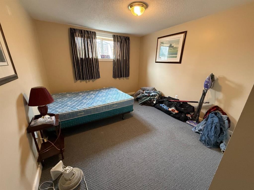 59 A&B Centennial Crescent, Swan Hills, AB - Indoor Photo Showing Bedroom