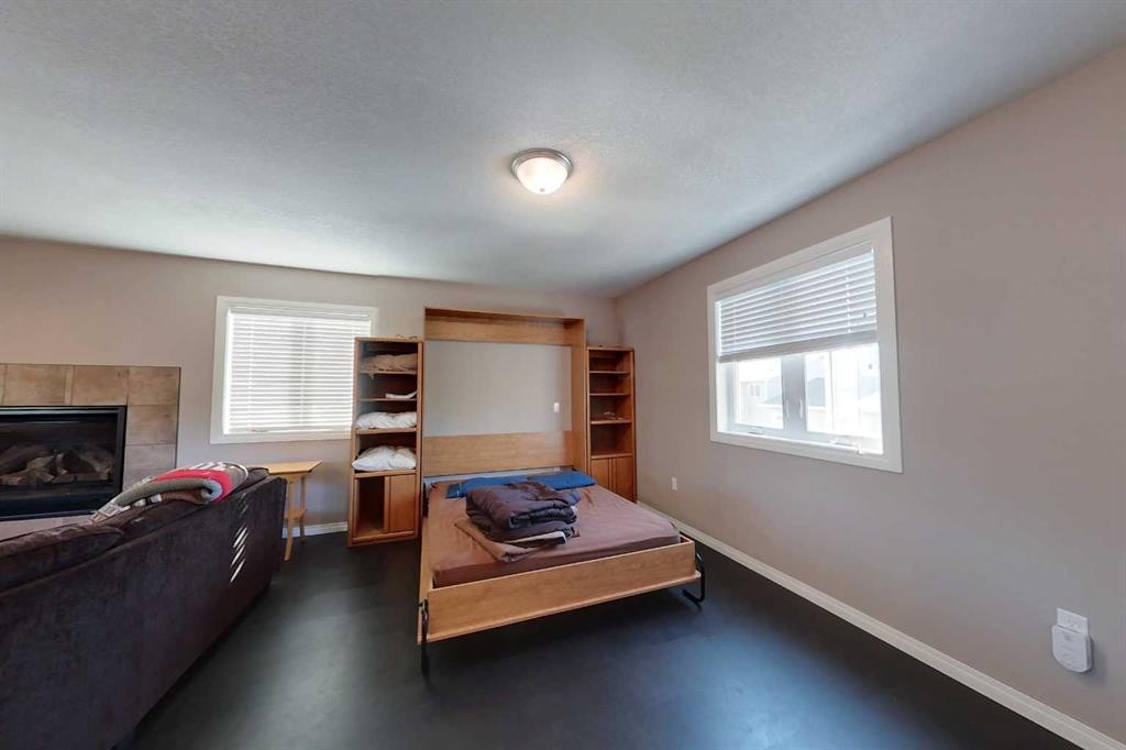 734041 Range Road, Wagner, AB - Indoor With Fireplace