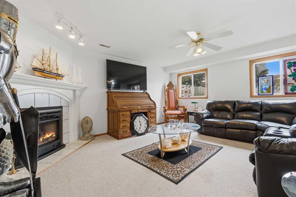 46 Atkinson Crescent, Whitecourt, AB - Indoor Photo Showing Living Room With Fireplace