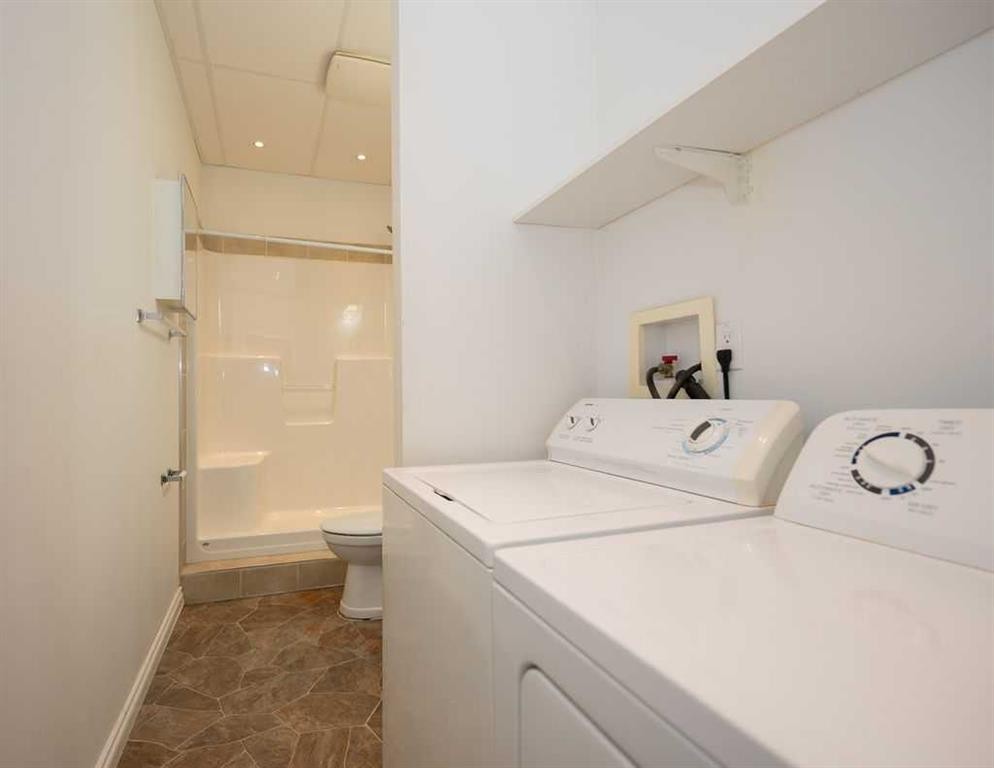 655059 Highway 813, Rural Athabasca County, AB - Indoor Photo Showing Laundry Room