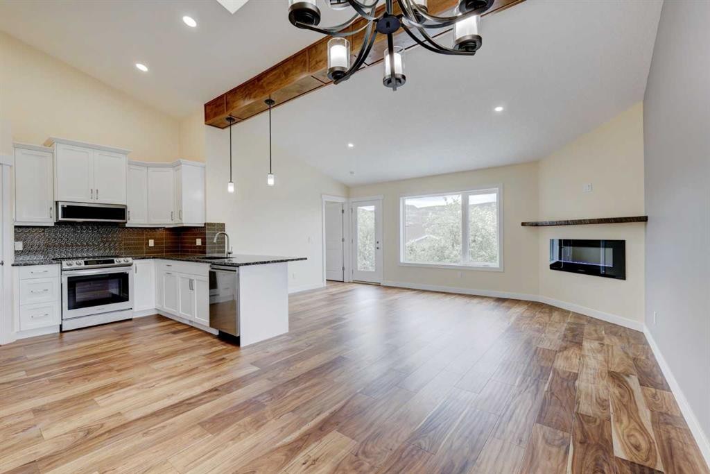 22 Garden Way, Drumheller, AB - Indoor With Fireplace