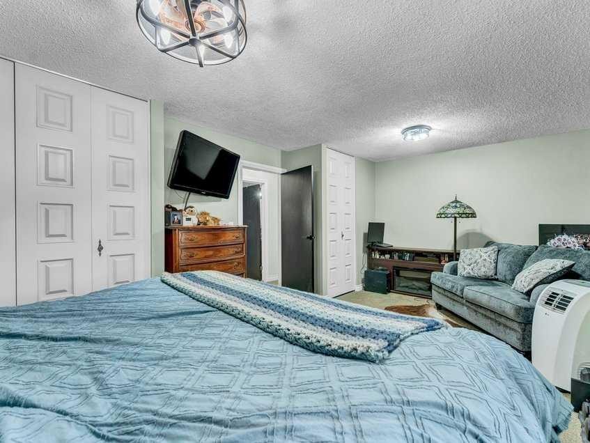 517 Tulip Street, Rosemary, AB - Indoor Photo Showing Bedroom