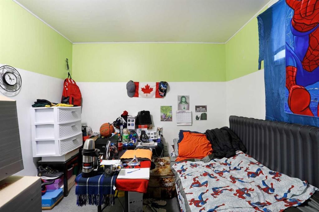60 Pleasant Park Road West, Brooks, AB - Indoor Photo Showing Bedroom