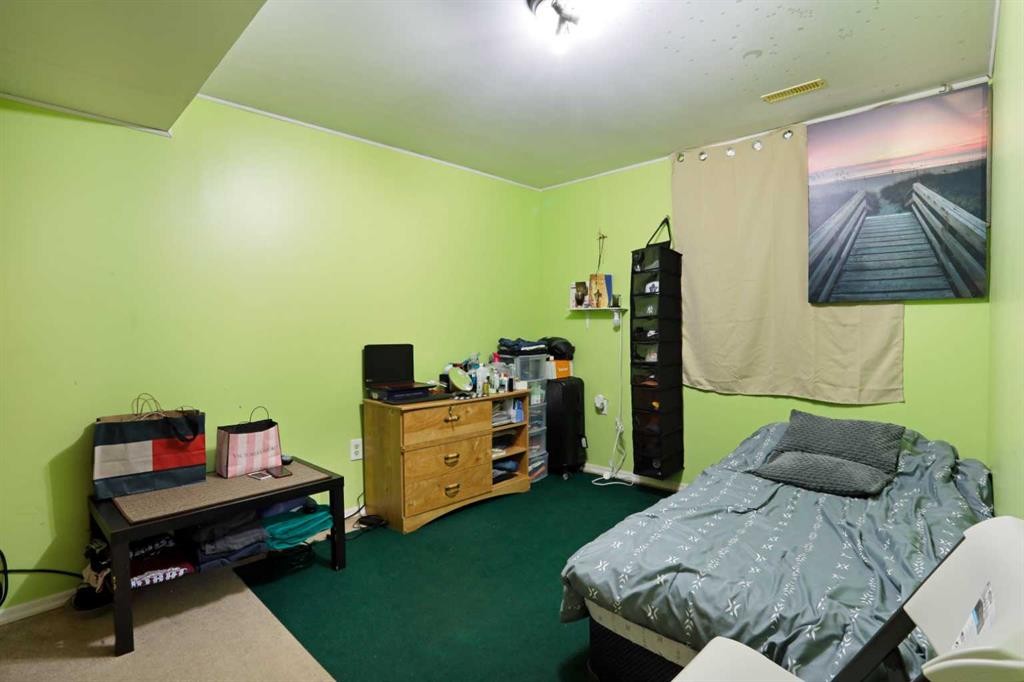 60 Pleasant Park Road West, Brooks, AB - Indoor Photo Showing Bedroom