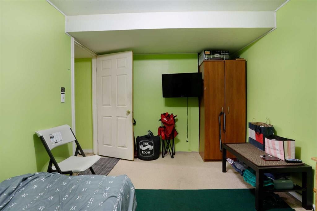 60 Pleasant Park Road West, Brooks, AB - Indoor Photo Showing Bedroom