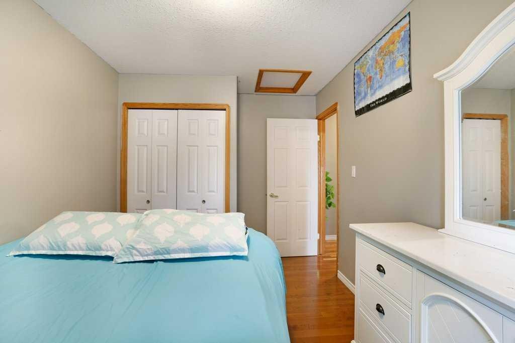 144 Upland Boulevard, Brooks, AB - Indoor Photo Showing Bedroom