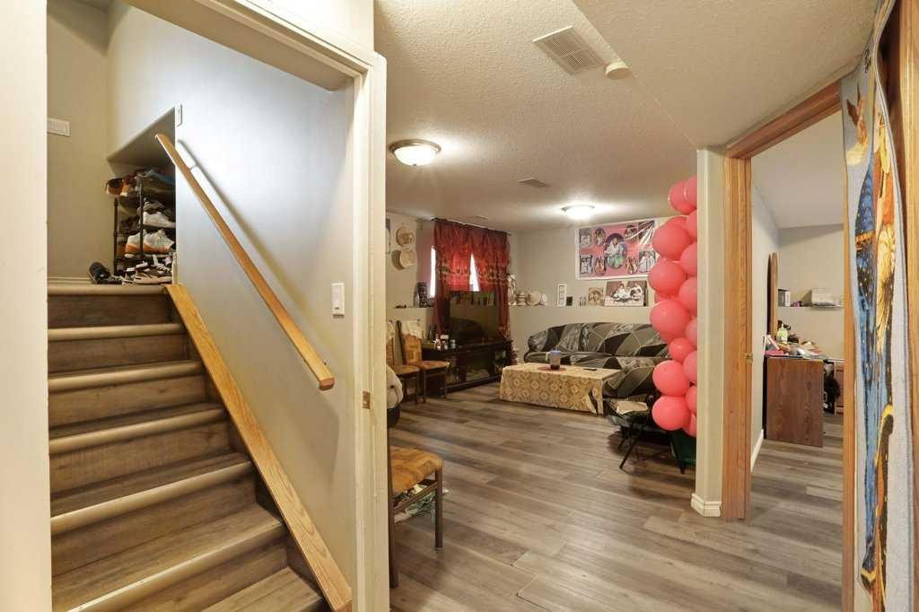 144 Upland Boulevard, Brooks, AB - Indoor Photo Showing Other Room