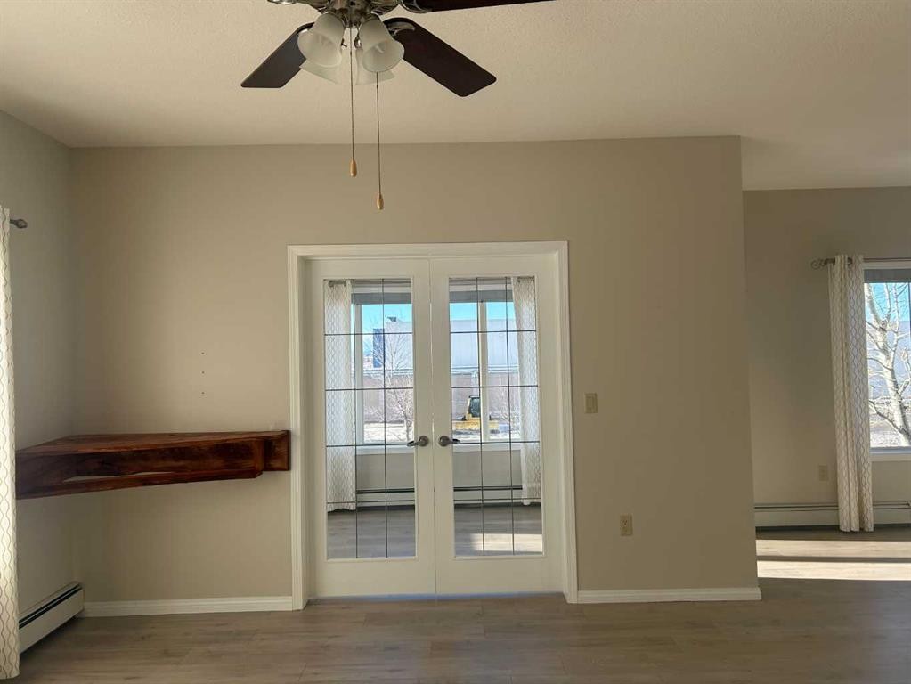 202-4403 67A Avenue, Olds, AB - Indoor Photo Showing Other Room