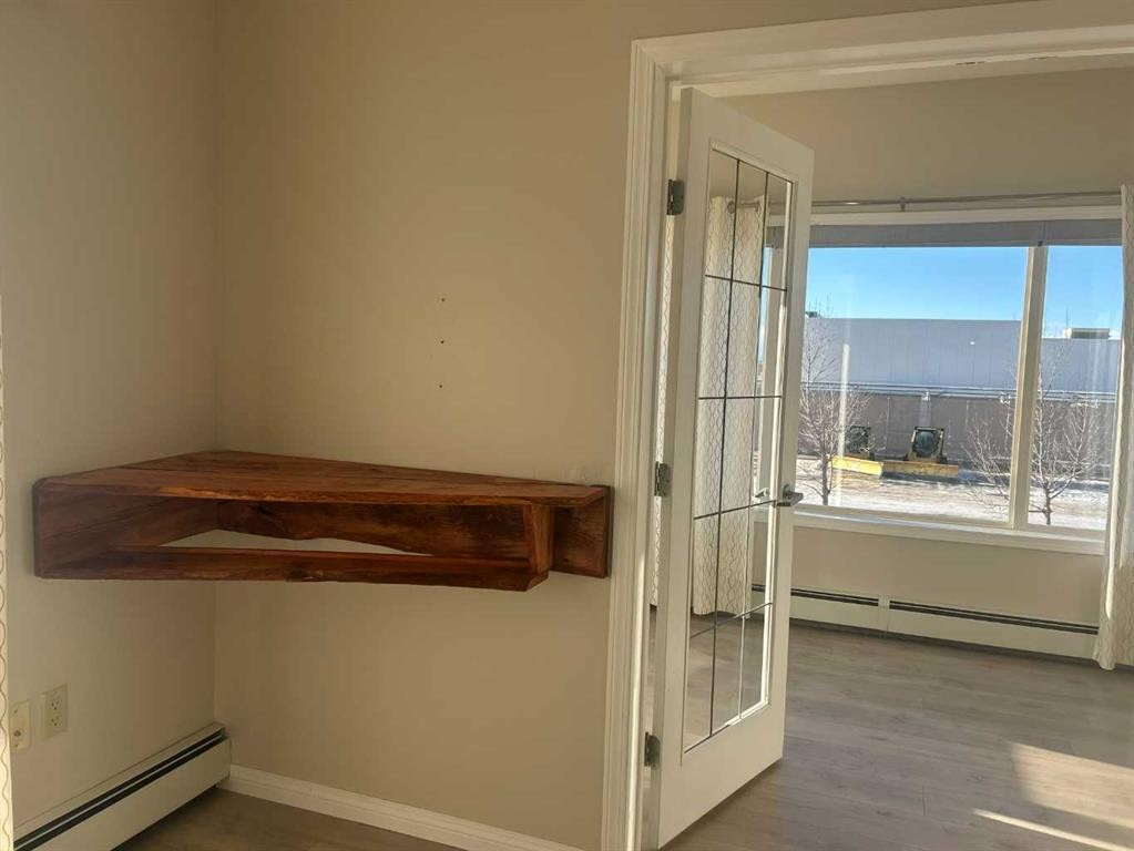 202-4403 67A Avenue, Olds, AB - Indoor Photo Showing Other Room