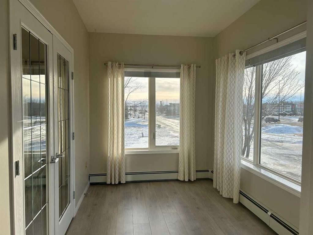 202-4403 67A Avenue, Olds, AB - Indoor Photo Showing Other Room