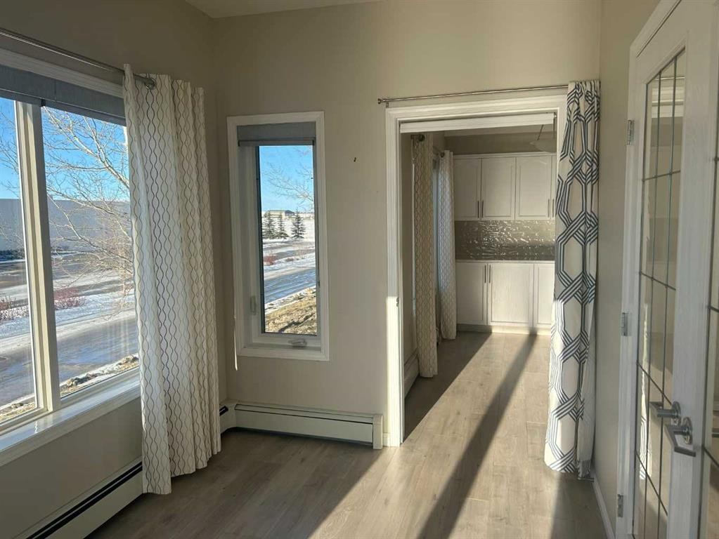 202-4403 67A Avenue, Olds, AB - Indoor Photo Showing Other Room