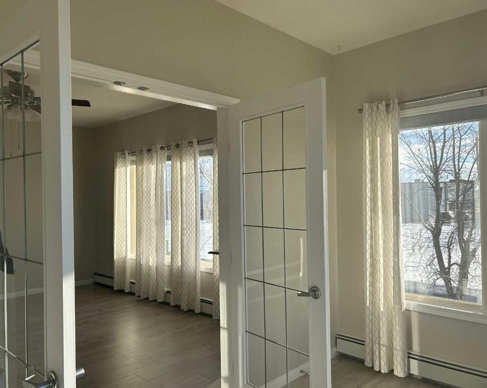 202-4403 67A Avenue, Olds, AB - Indoor Photo Showing Other Room
