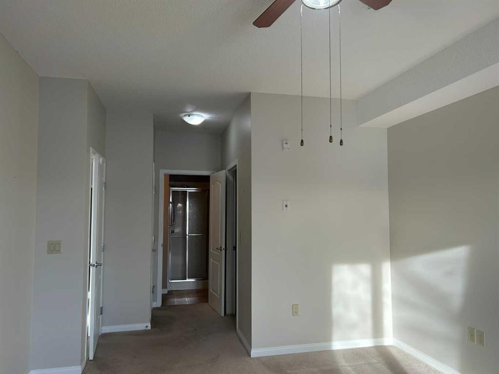 202-4403 67A Avenue, Olds, AB - Indoor Photo Showing Other Room