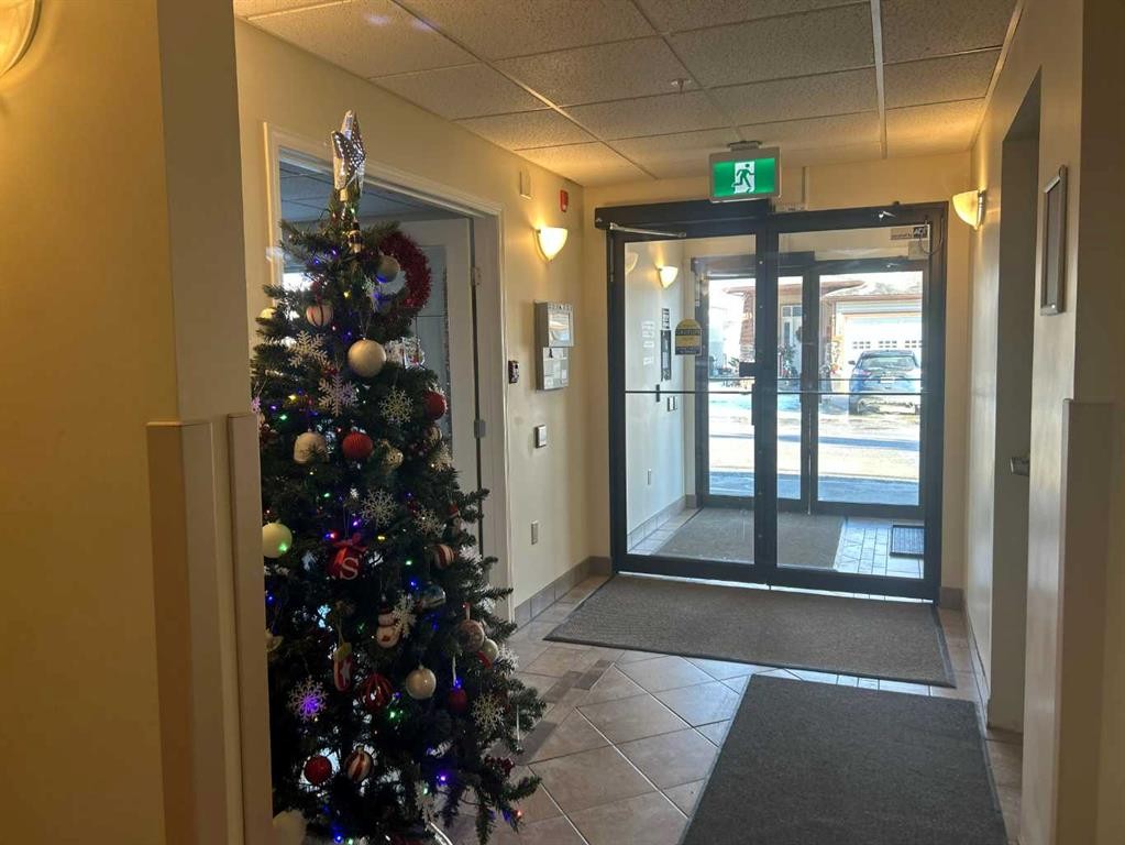 202-4403 67A Avenue, Olds, AB - Indoor Photo Showing Other Room