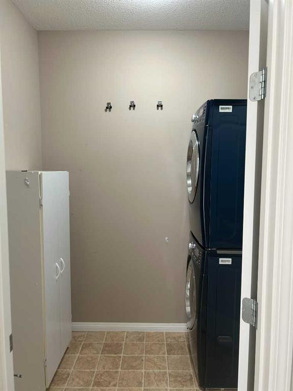 202-4403 67A Avenue, Olds, AB - Indoor Photo Showing Laundry Room