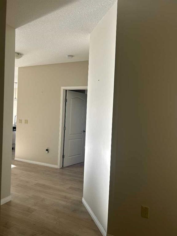 202-4403 67A Avenue, Olds, AB - Indoor Photo Showing Other Room
