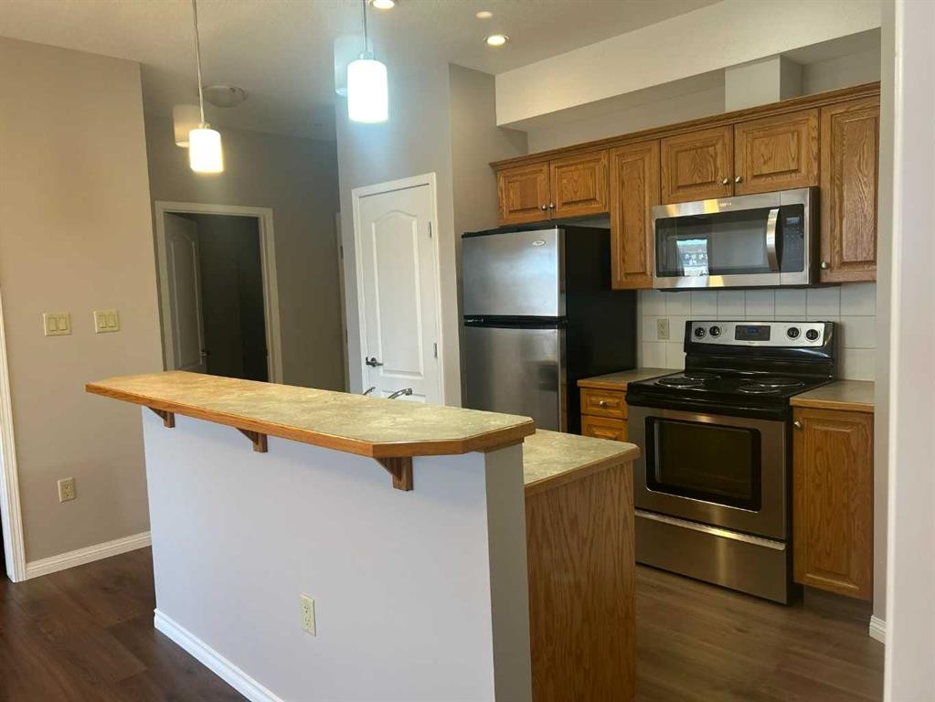 307-4403 67A Avenue, Olds, AB - Indoor Photo Showing Kitchen