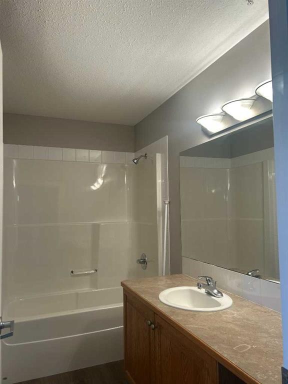 307-4403 67A Avenue, Olds, AB - Indoor Photo Showing Bathroom