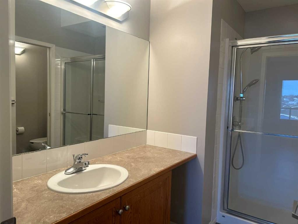 307-4403 67A Avenue, Olds, AB - Indoor Photo Showing Bathroom