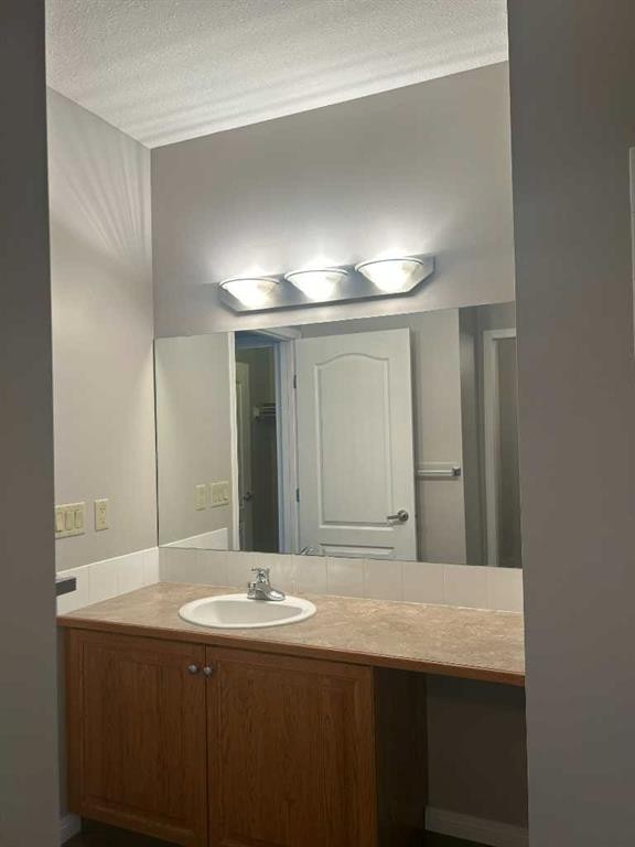307-4403 67A Avenue, Olds, AB - Indoor Photo Showing Bathroom
