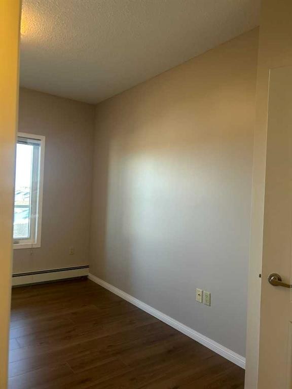 307-4403 67A Avenue, Olds, AB - Indoor Photo Showing Other Room