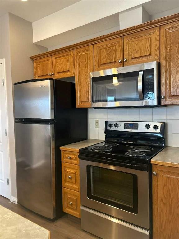 307-4403 67A Avenue, Olds, AB - Indoor Photo Showing Kitchen